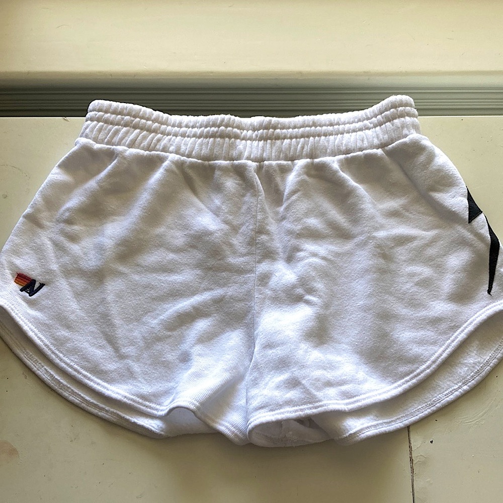 Aviator Nation- White shorts with a black lightning bolt- Size: Large